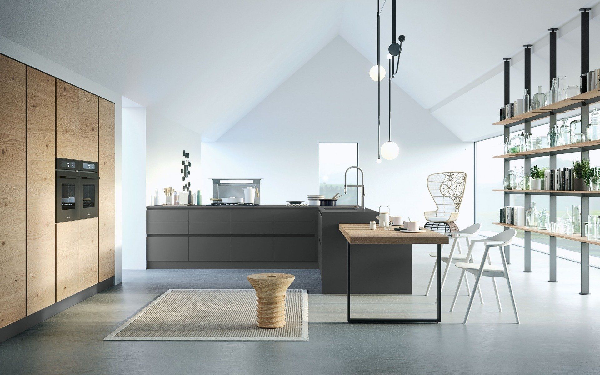 rénovation d'architecte d'une cuisine d'angle gris foncé mat avec sol en béton ciré gris et suspensions noirs